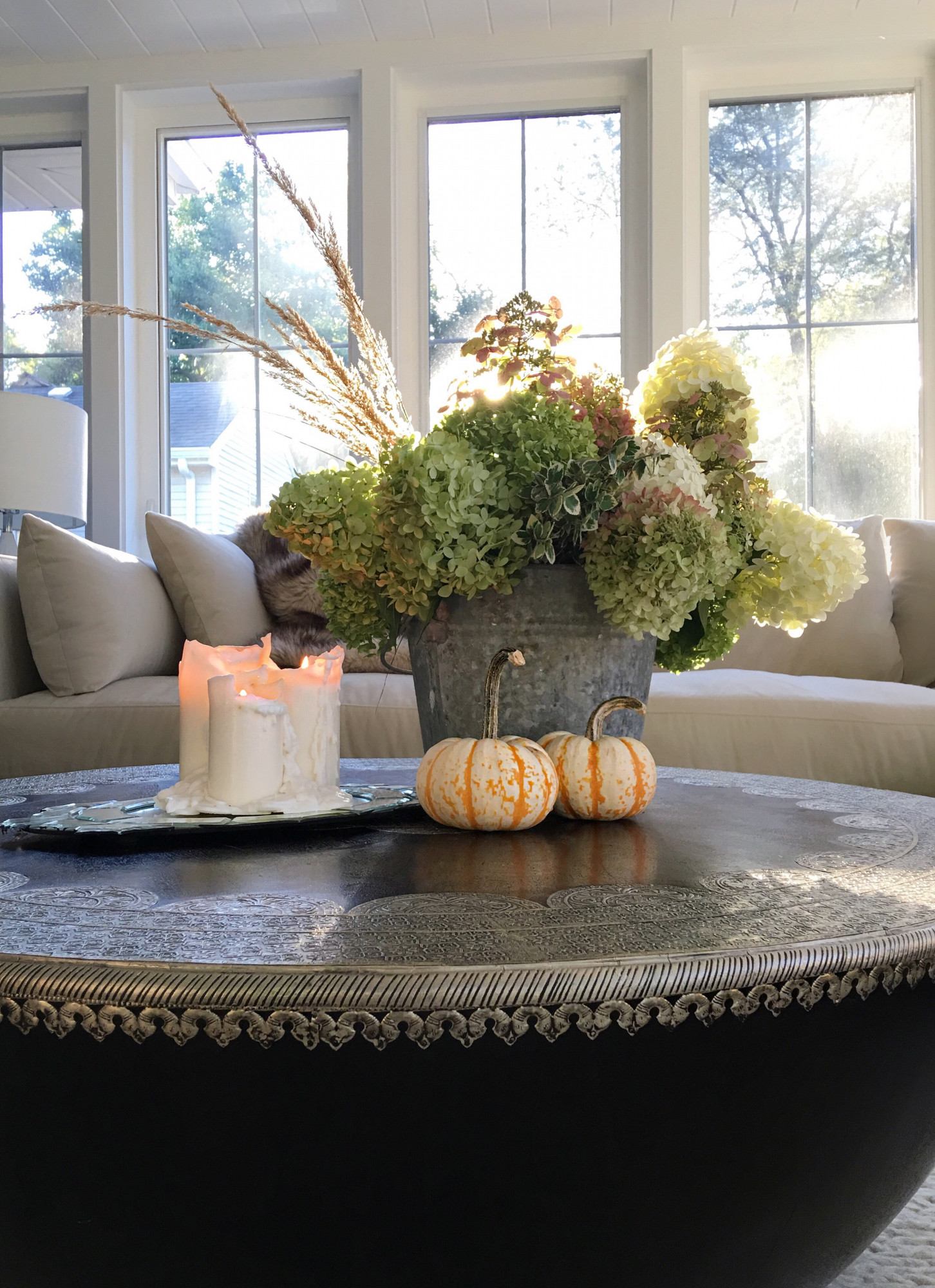 Cozying up to these plaid couches on this crisp fall day – the