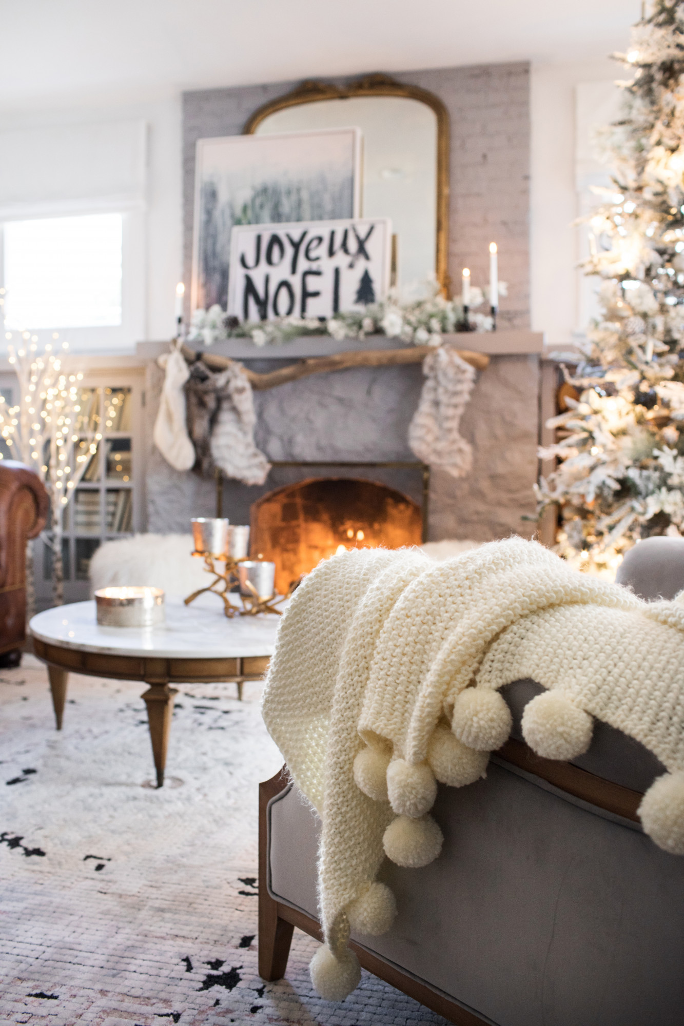 Cozy Scene in an Enchanting Fireplace Room Featuring Lindsay Letters Artwork